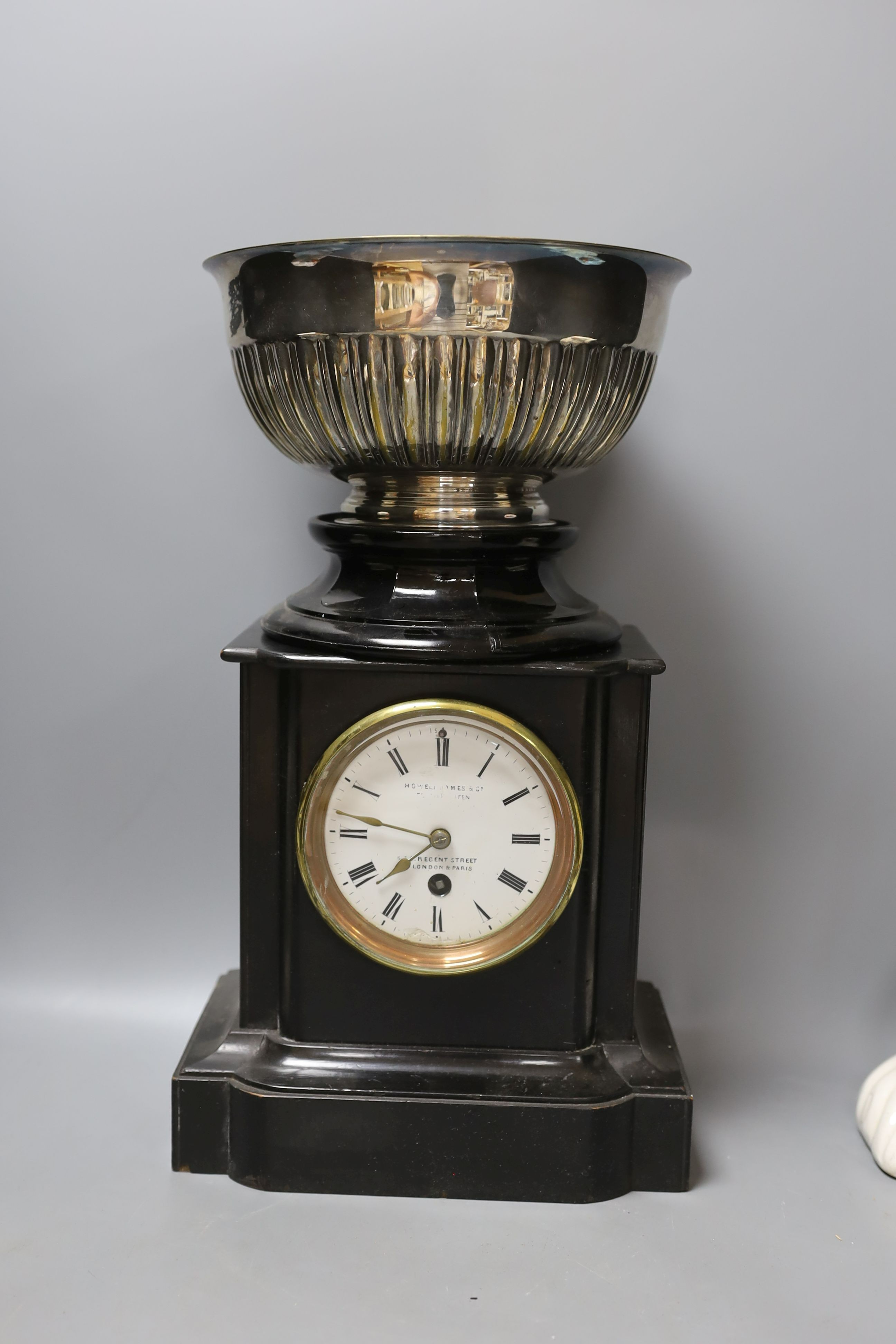 A pair of Staffordshire dogs, together with a pottery brush pot, Howell James mantle clock and other miscellaneous items including postal scales (7)